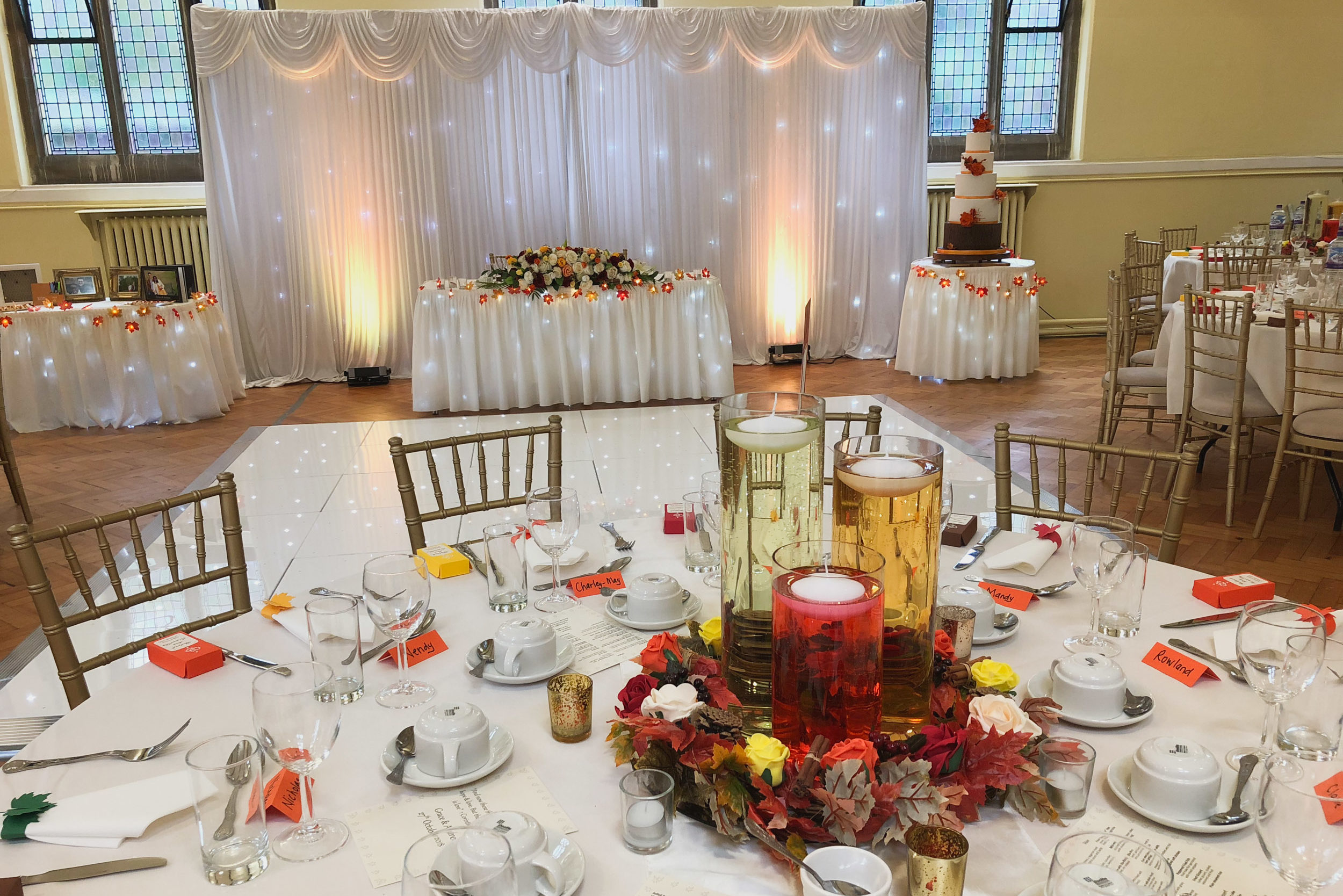 Autumn inspired wedding centrepieces floating candles